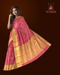 Graceful Coral Pink Kanchipuram Silk Saree with Delicate Butta Motifs