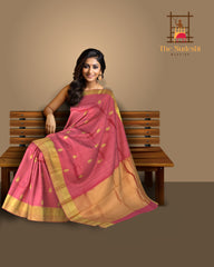 Graceful Coral Pink Kanchipuram Silk Saree with Delicate Butta Motifs