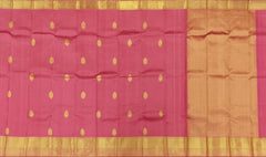 Graceful Coral Pink Kanchipuram Silk Saree with Delicate Butta Motifs