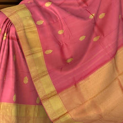 Graceful Coral Pink Kanchipuram Silk Saree with Delicate Butta Motifs