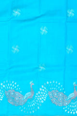 Enchanting Sky Blue Kanchipuram Silk Saree with One-Side Border and Peacock Motifs