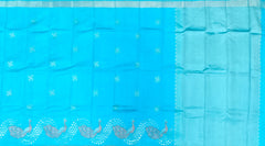 Enchanting Sky Blue Kanchipuram Silk Saree with One-Side Border and Peacock Motifs