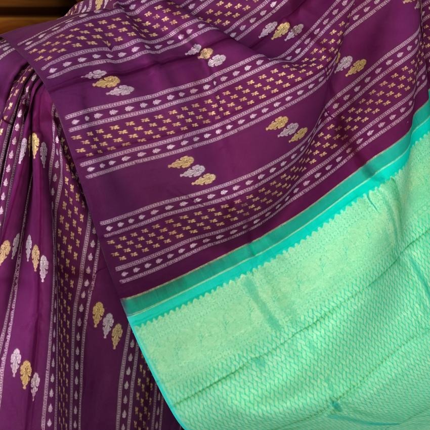 Deep Plum Borderless Kanchipuram Silk Saree with Vertical Pattern and Cyan Blue Pallu