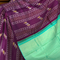 Deep Plum Borderless Kanchipuram Silk Saree with Vertical Pattern and Cyan Blue Pallu
