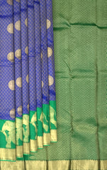 Green Kanchipuram Silk Saree with Annam Bhutta and Elephant Motif Border