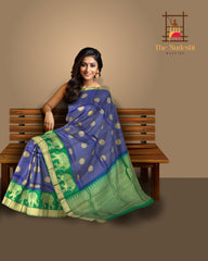 Green Kanchipuram Silk Saree with Annam Bhutta and Elephant Motif Border