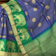 Green Kanchipuram Silk Saree with Annam Bhutta and Elephant Motif Border