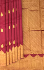 Maroon Kanchipuram Silk Saree with Elephant Turning Border and Bhutta Work