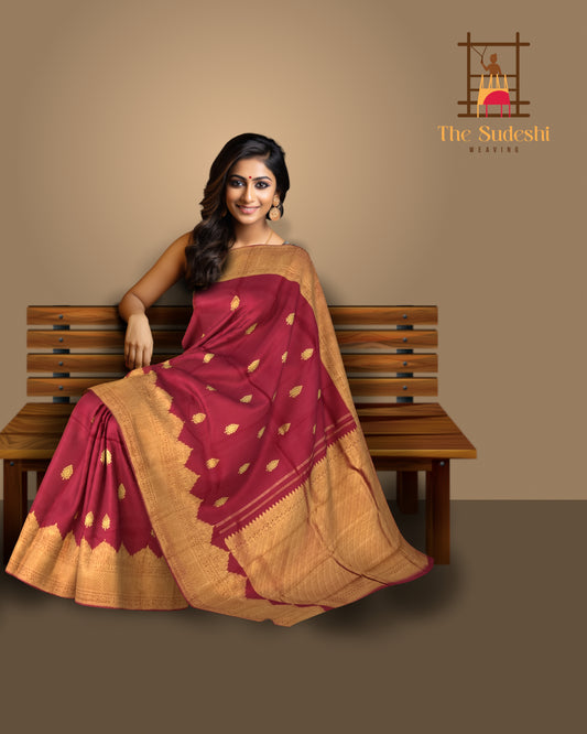 Maroon Kanchipuram Silk Saree with Elephant Turning Border and Bhutta Work