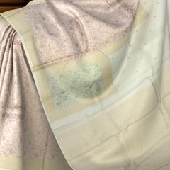Offwhite Kanchipuram Silk Saree with Meenakari Floral Border and Tear-Shaped Bhuttas