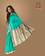 Sea Green Kanchipuram Silk Saree with Dull Maroon Border and Small Buttas
