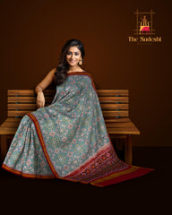 Maroon Sky Blue Navratna Patola Saree