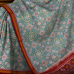 Maroon Sky Blue Navratna Patola Saree