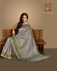 Off White Single Ikat Rajkot Patola Saree with Daliyabhat Butti Design