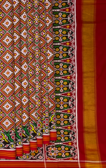 Maroon Double Ikat Patola Saree with Chanda Bhat and Tri Phool Design