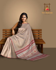 Peach Eri Silk Saree with Red Border from Kamrup