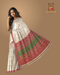 Beige Tussar Saree from Assam with Reddish Pink Border and Forest Green Pallu