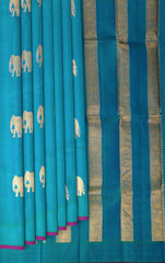 Bluish Green Borderless Kanchipuram Pure Zari Silk Saree with Elephant motifs, and Self-colored Pallu and Blouse