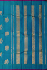 Bluish Green Borderless Kanchipuram Pure Zari Silk Saree with Elephant motifs, and Self-colored Pallu and Blouse