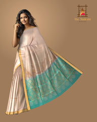 Beige Soft Silk Saree with Sea Green Border and Bhutta Motifs