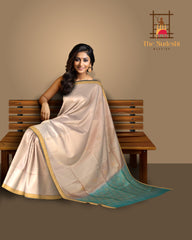 Beige Soft Silk Saree with Sea Green Border and Bhutta Motifs