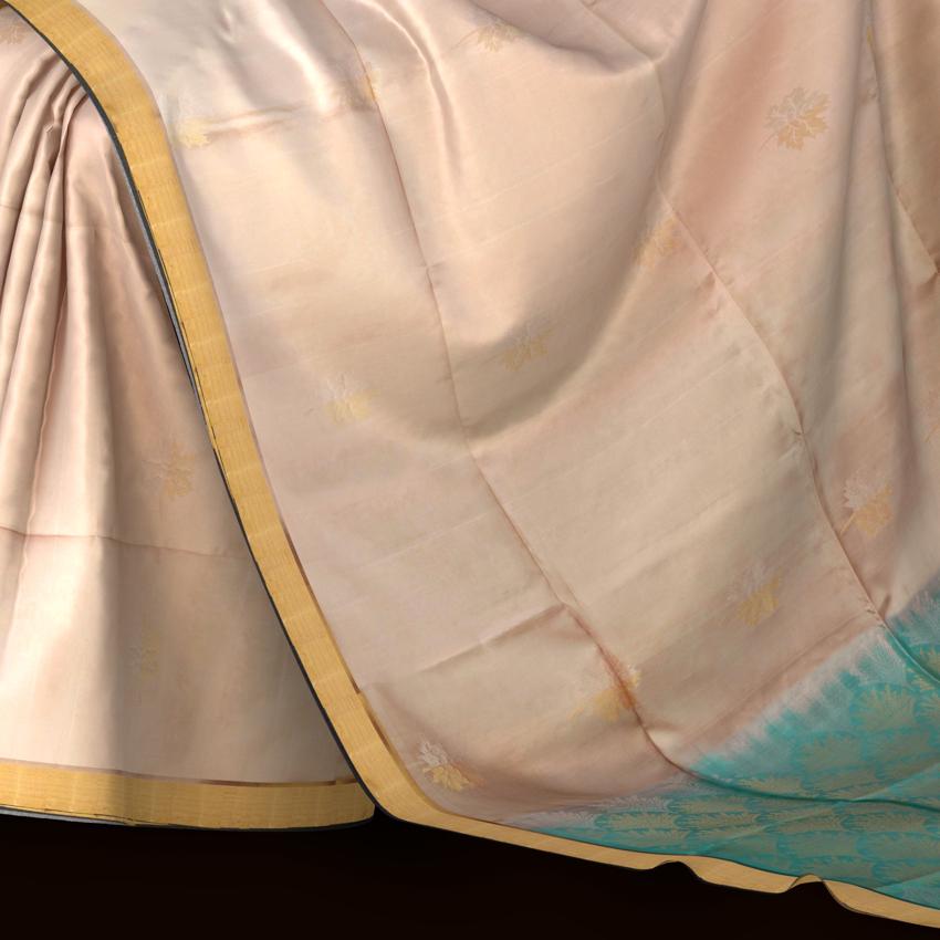 Beige Soft Silk Saree with Sea Green Border and Bhutta Motifs