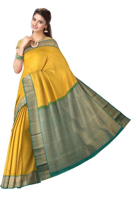 Yellow Kanchipuram Silk Saree with Floral Jackard on the body with Copper Sulphate Blue contrast border and Copper Sulphate Blue Diamond pallu