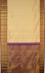 Off White Kanchipuram Silk Saree with Rudraksham Jackard on the body with Wine Purple contrast border and Wine Purple Grand embossed Kamalam motif intricately designed pallu