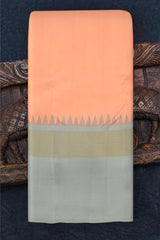 Peach Kanchipuram Silk Saree with embossed diamond zari on the body with Grey and Black contrast border and pallu