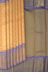 Light Orange Kanchipuram Silk Saree with large diamond motif design on the body with lavender contrast border featuring varusai pet border and annam, small diamond designs in pallu