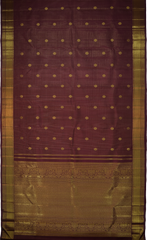 Coffee Brown Kanchipuram Silk Saree with checks and podi zari kattam with kamalam butta designs on the body with self kuyil kann with kolam design border and floral with diamond design and hexagon varisapet designs in pallu