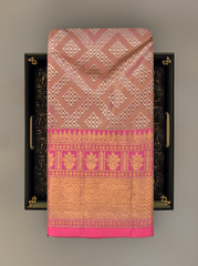 Baby Pink Kanchipuram jacquard Silk Saree with embossed and brocade designs on the body with dark candy pink contrast border and rich grand intricately designed pallu