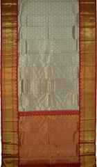 Steel Gray Kanchipuram Silk Saree with Tissue, Embossed, Brocade on the body with red contrast border and pallu featuring peacock, elephant, grand, intricately designed